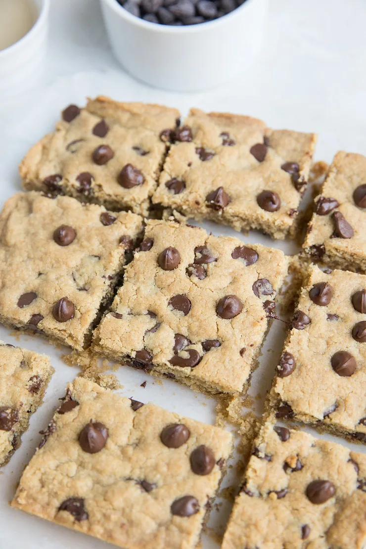 Easy Chocolate Chip Tahini Cookie Bars made flourless, grain-free, dairy-free, and refined sugar-free with only 6 ingredients!