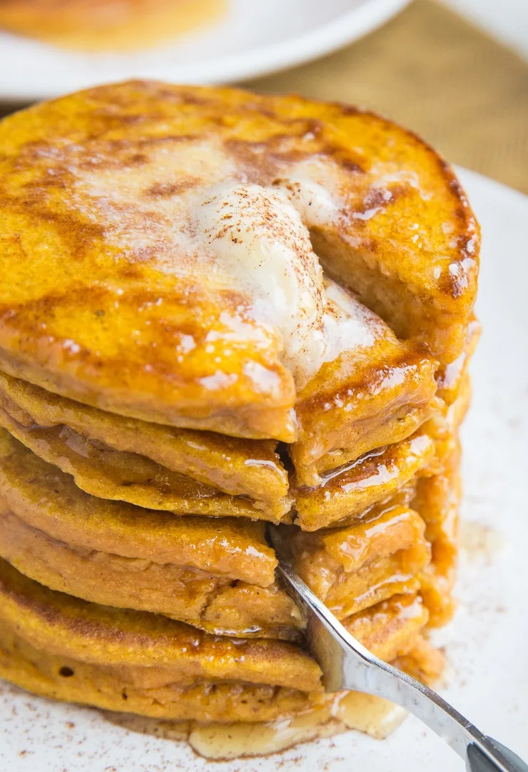 Fluffy Flourless Pumpkin Protein Pancakes made gluten-free and dairy-free. An amazing healthy pancakes recipe!
