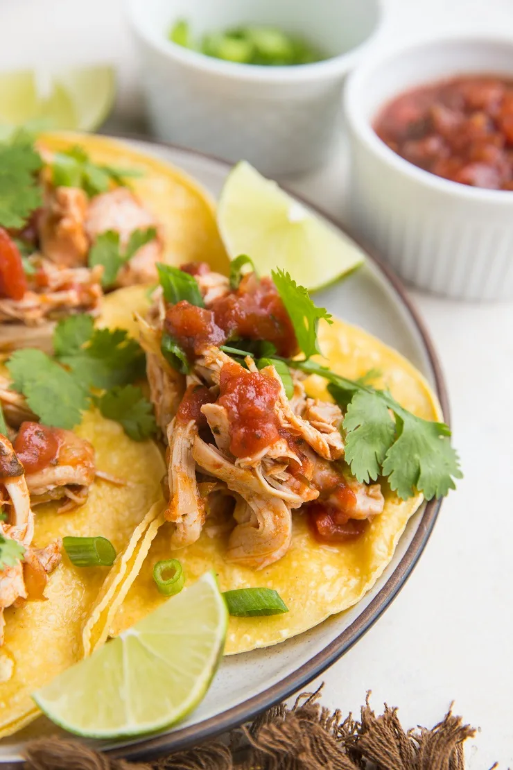 Instant Pot Chicken Tacos are perfectly tender and so easy to make! Only 5 ingredients required!