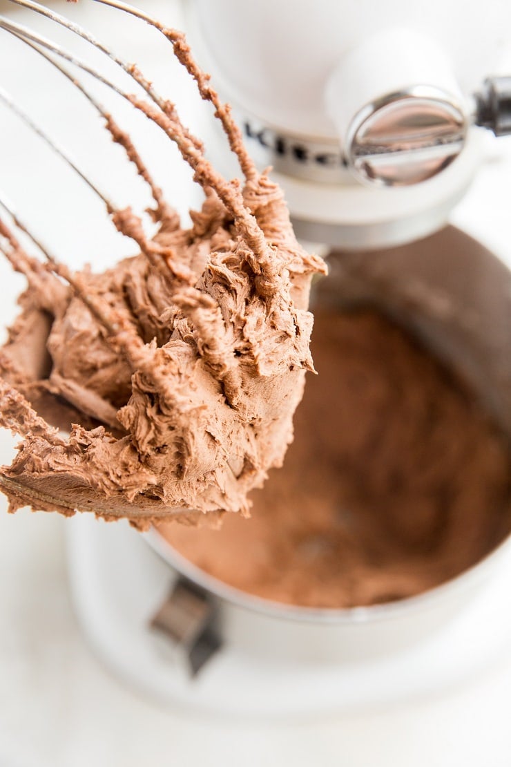 Keto Chocolate Buttercream Recipe with paleo, vegan, dairy-free options. Sugar-free buttercream for cakes, brownies, cookies, cupcakes, and more!