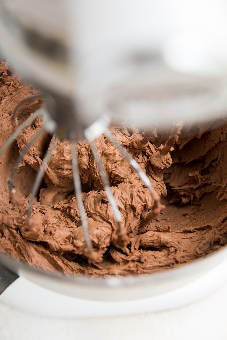 Keto Chocolate Buttercream with paleo and vegan options. Rich, creamy, delicious chocolate frosting for cakes and cupcakes.