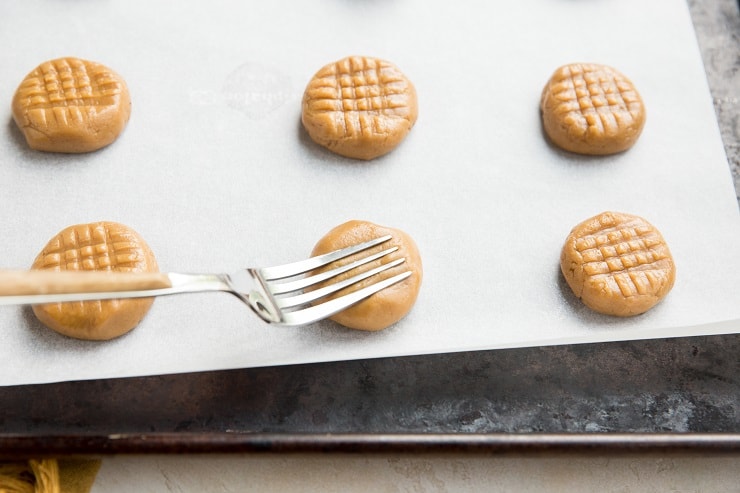 Make crisscross indentations in the dough using a fork