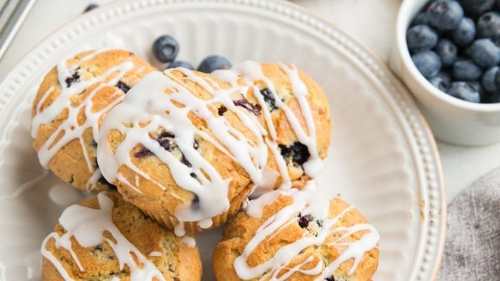 Keto Lemon Poppy Seed Blueberry Muffins with lemon glaze are an amazing breakfast or snack