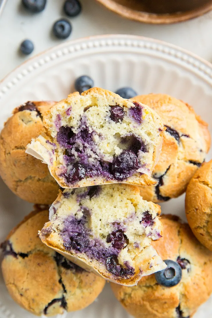 Low-Carb Lemon Poppy Seed Blueberry Muffins are incredibly moist, flavorful, zesty and fluffy! You'd never guess they're keto friendly!