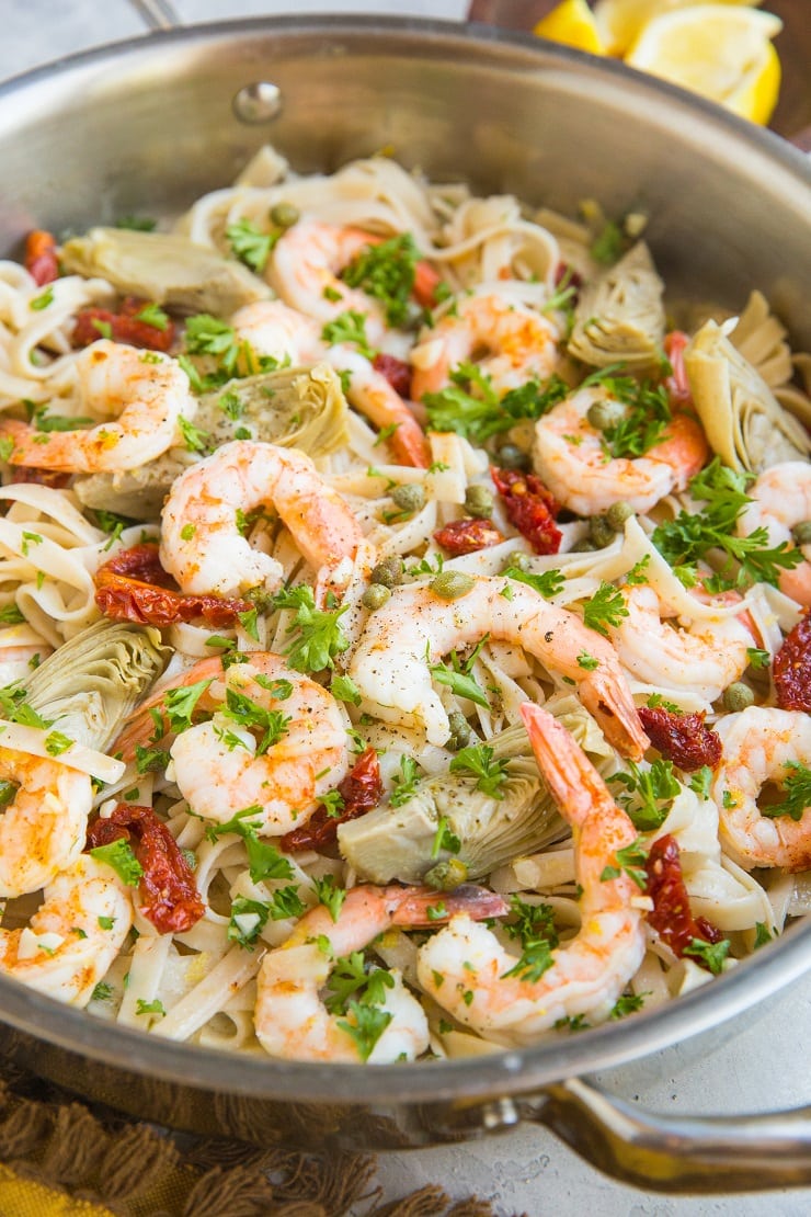 Gluten-Free Dairy-Free Mediterranean Shrimp Pasta with sun-dried tomatoes, artichoke hearts and capers in a lemon garlic cream sauce (that happens to be dairy-free)