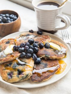 Paleo Blueberry Pancakes made with coconut flour. Low-carb, dairy-free and keto friendly! An easy, delicious breakfast recipe.