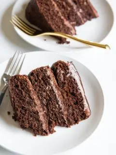 Triple Chocolate Paleo Chocolate Cake made with chocolate buttercream and ganache. Grain-free, refined sugar-free, dairy-free, moist, rich and decadent!