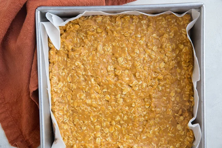 Transfer pumpkin oatmeal mixture to a parchment-lined baking pan