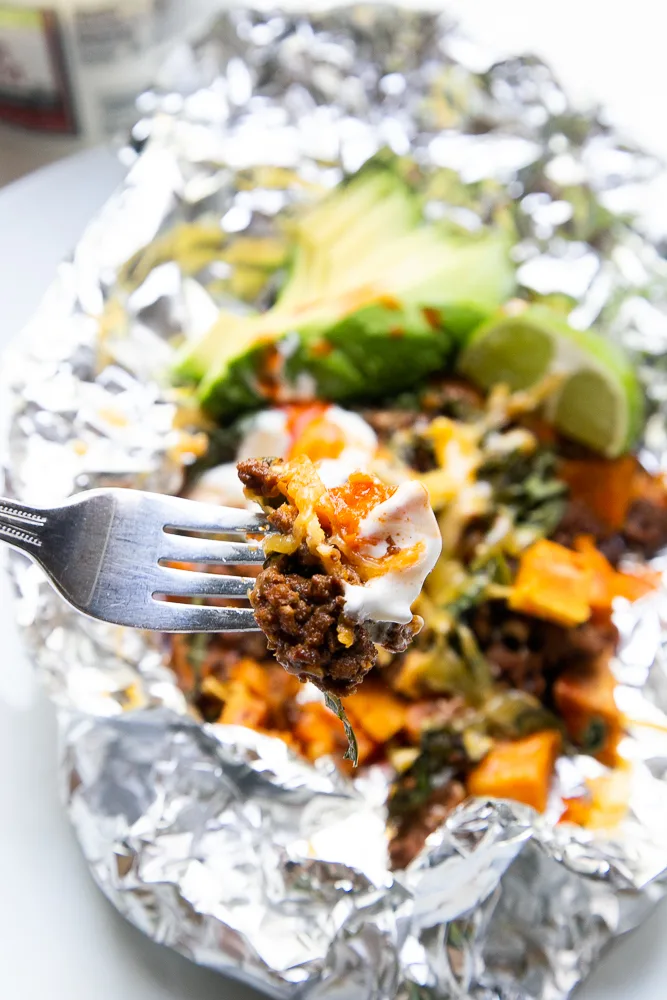 Foil Packet Sweet Potato Tacos - Amazingly flavorful, nutritious tacos loaded up with your favorite toppings are fun to prepare and so easy to make! Great as a make-ahead meal for a grab-and-go taco!