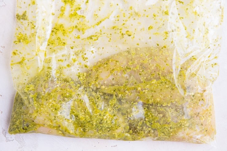 Marinate the chicken in pesto sauce