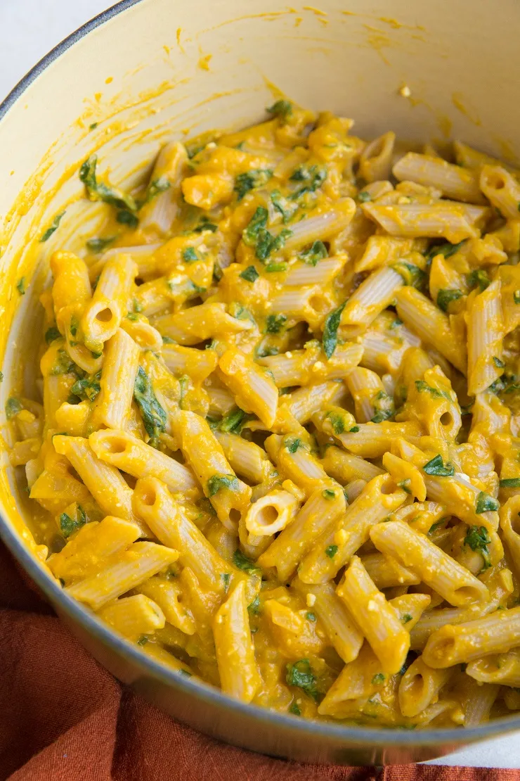 Pumpkin Pasta with spinach and feta made gluten-free. A healthier, comforting pasta recipe.