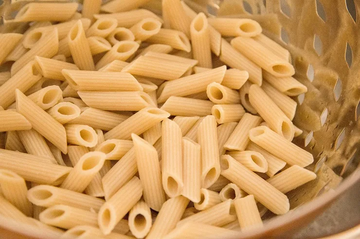 Pasta noodles in a colander
