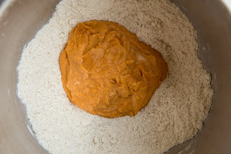 Add the pumpkin mixture to the mixer with the flour mixture