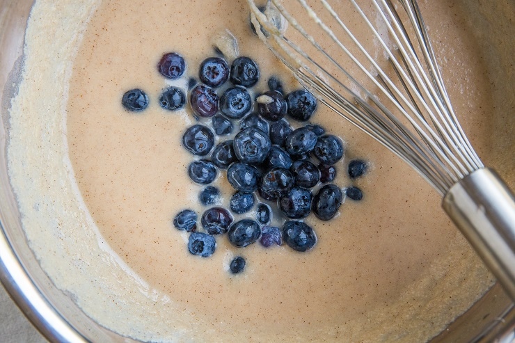 Mix the ingredients for the blueberry pancakes in a mixing bowl