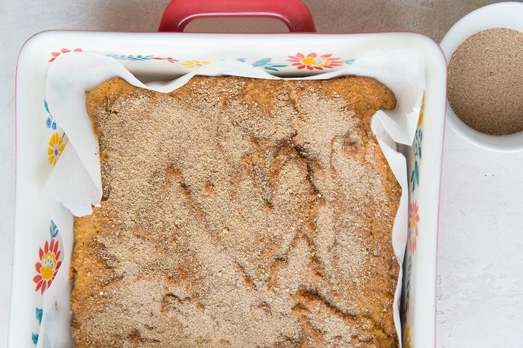 Sprinkle cinnamon and sugar over the cookie bars