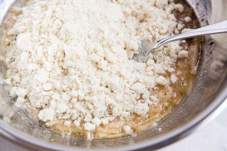 Add the flour mixture to the bowl with the wet mixture