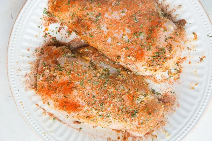 Coat the chicken breast with oil and sprinkle with seasonings.