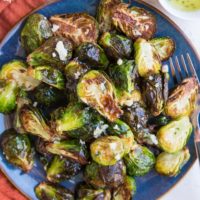 Air Fryer Garlic Butter Brussel Sprouts are easy to toss together any night of the week. The best golden-brown crispy, perfectly cooked brussels with tons of flavor!