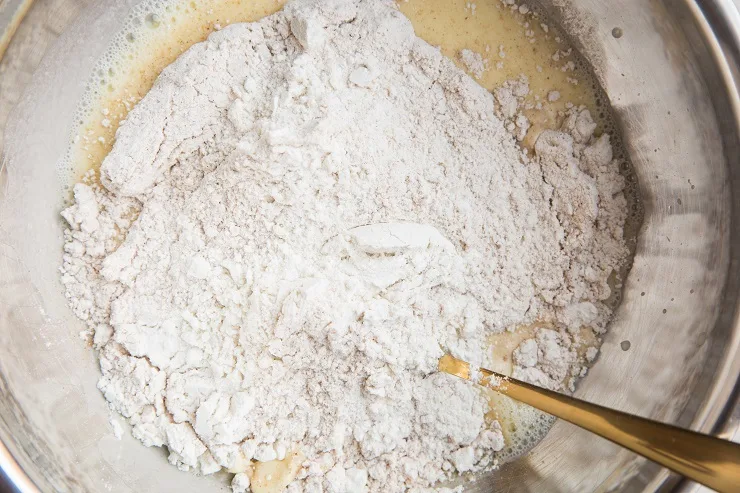Combine the wet and dry ingredients for the fritters until a thick dough forms