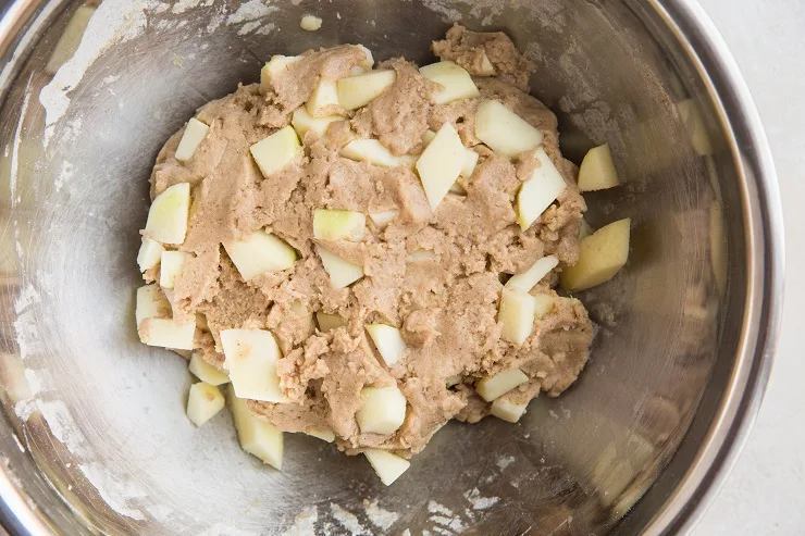 Mix apples into the dough until evenly distributed
