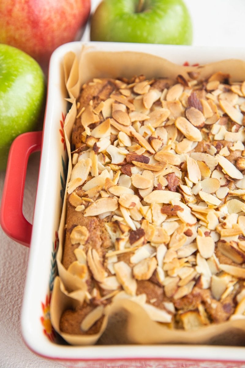 Close up image of fresh apple cake, newly out of the oven in a cake pan