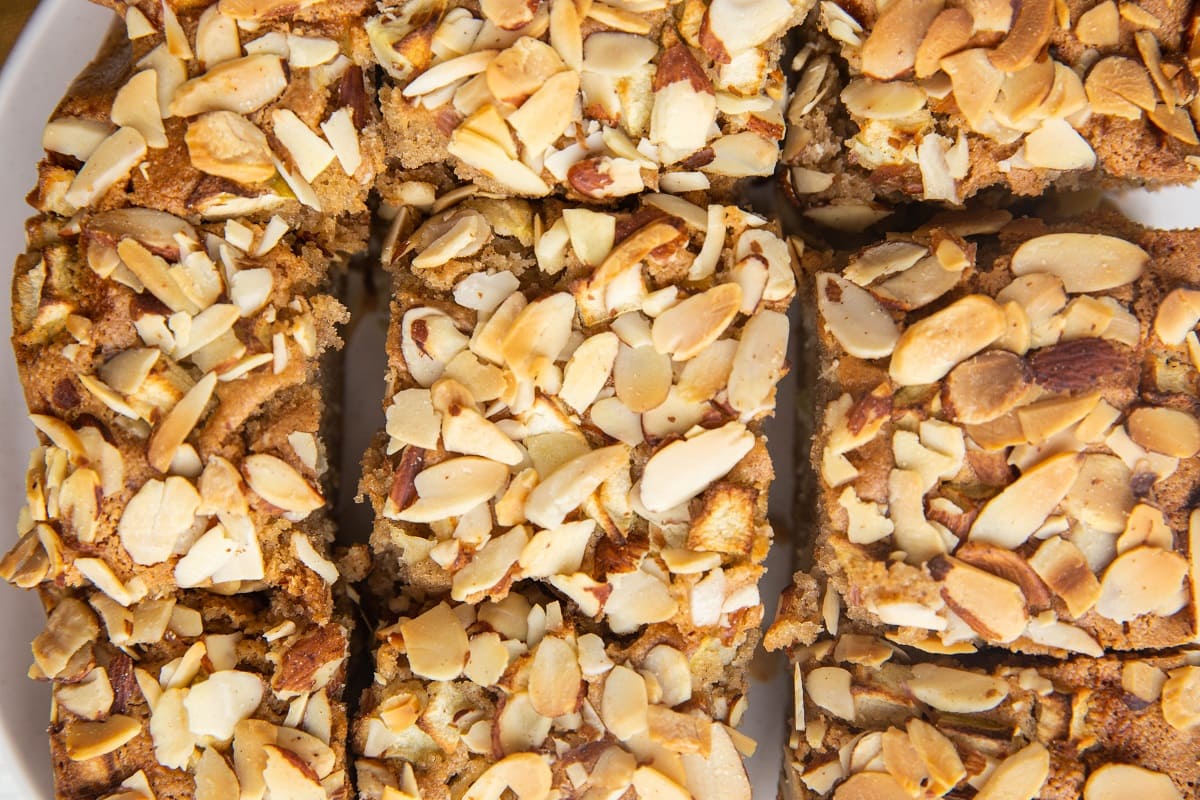 horizontal photo of sliced apple cake.