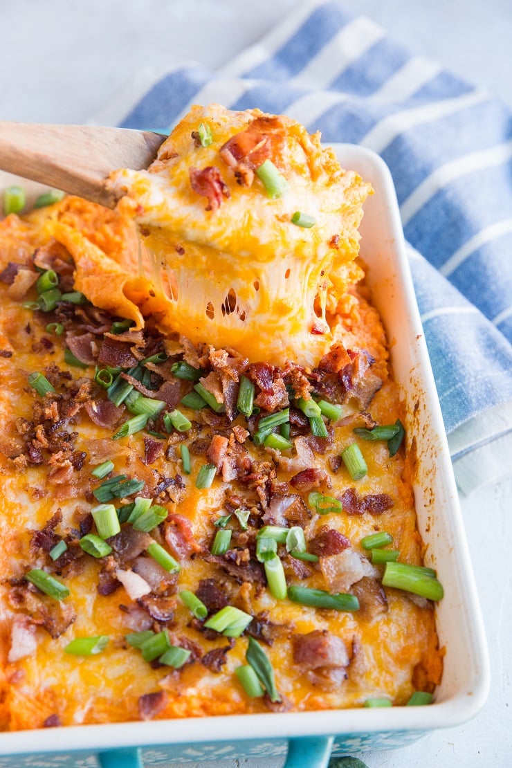Cheesy savory Sweet Potato Casserole with Bacon is a delicious side dish for serving friends and family at any dinner