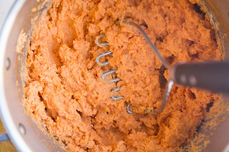 Mash the sweet potatoes with butter, greek yogurt, garlic powder and sea salt