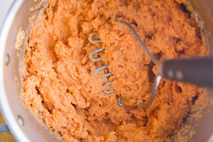 Mash the sweet potatoes with butter, greek yogurt, garlic powder and sea salt