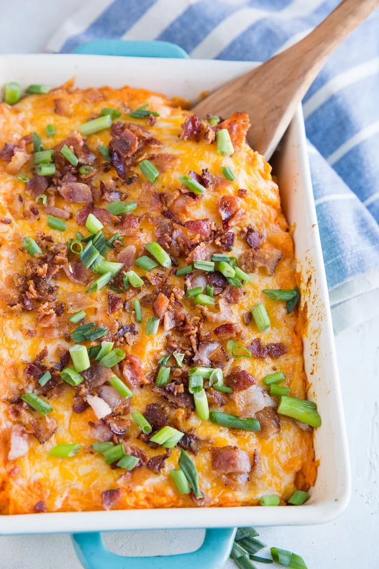 Cheesy Mashed Sweet Potato Casserole with Bacon - a savory sweet potato casserole recipe that is loaded with flavor. A marvelous side dish to share with guests