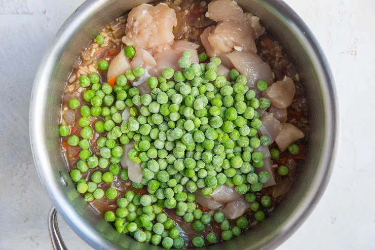 Add the chicken and peas to the pot