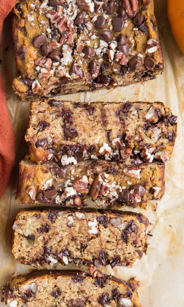 Paleo Pumpkin Banana Bread with chocolate chips and pecans. Made with coconut flour and pure maple syrup, this healthy banana bread recipe is grain-free, refined sugar-free, nut-free, oil-free, and dairy-free!