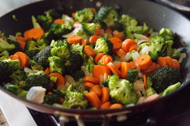 Add the carrots and broccoli and continue cooking