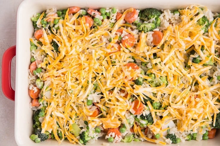 Sprinkle the vegetables and rice with grated colby jack cheese and bake in the preheated oven for 10 to 15 minutes, or until the cheese has melted.