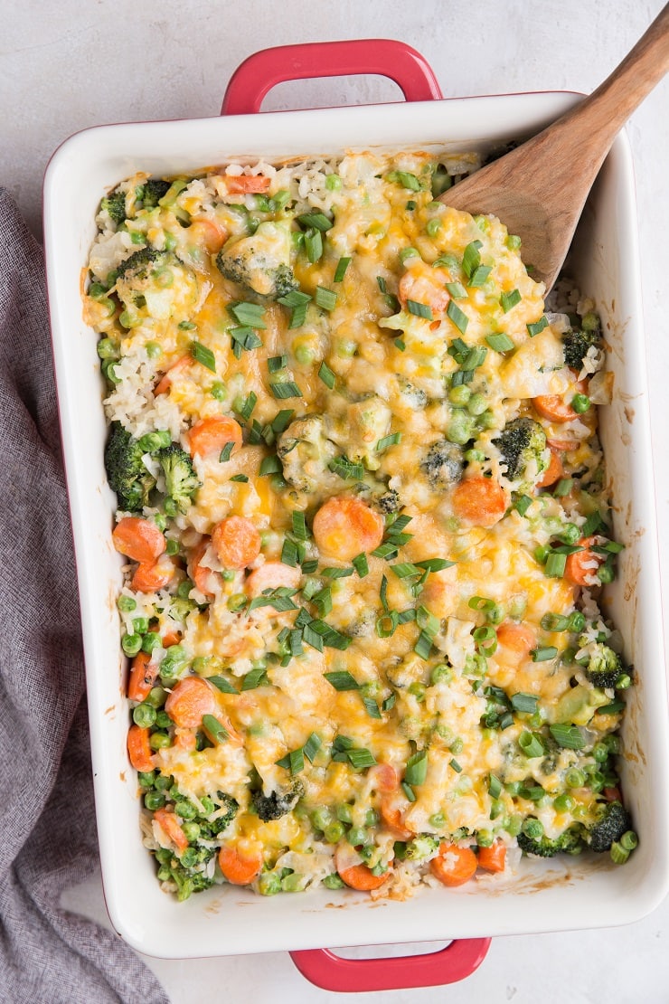 Cheesy Vegetable Brown Rice Casserole with hearty vegetables, creamy rice and cheese. A delicious yet healthier side dish perfect for any meal.