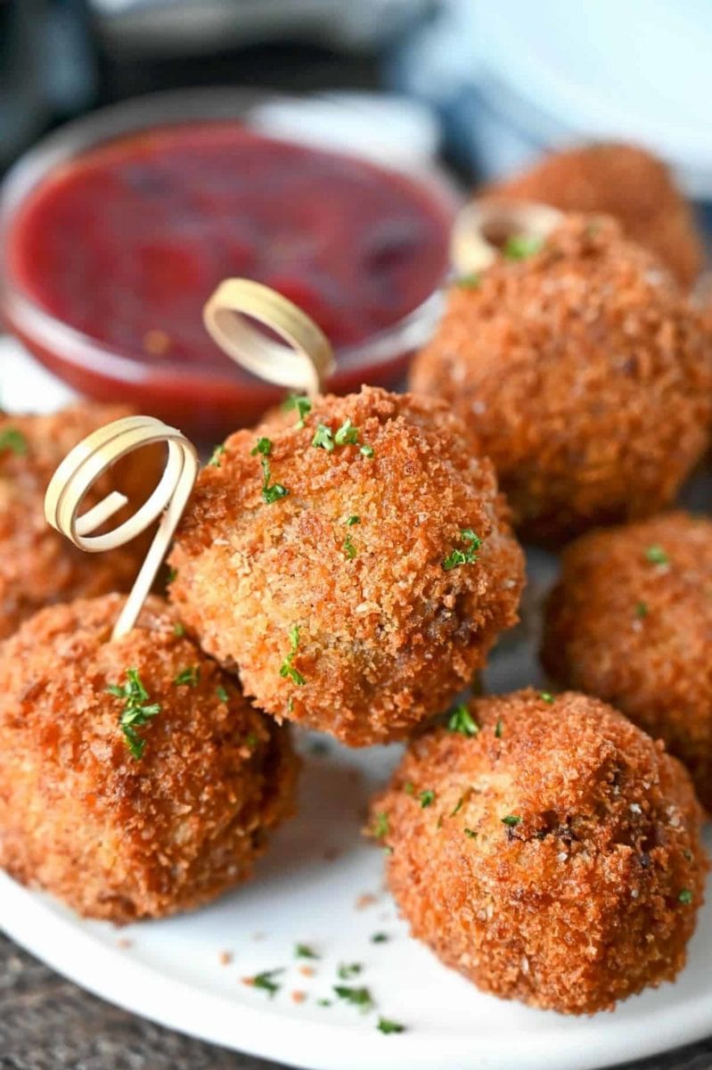 Deep fried stuffing balls are a delicious way to use up those holiday leftovers. Great for just snacking, game day, or holiday gatherings.