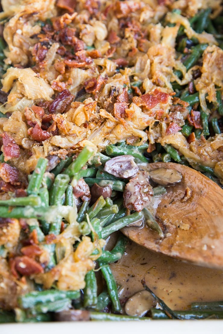 Rustic Mediterranean Green Bean Casserole with sun-dried tomatoes and kalamata olives. Gluten-free, dairy-free, and packed with flavor for an amazing side dish!