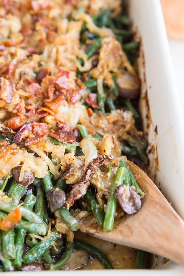 Mediterranean Green Bean Casserole with kalamata olives and sun-dried tomatoes. A delicious healthy unique take on classic green bean casserole