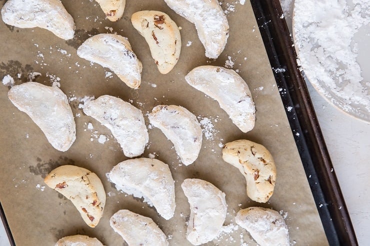 Roll the Mexican Wedding Cookies in powdered sugar