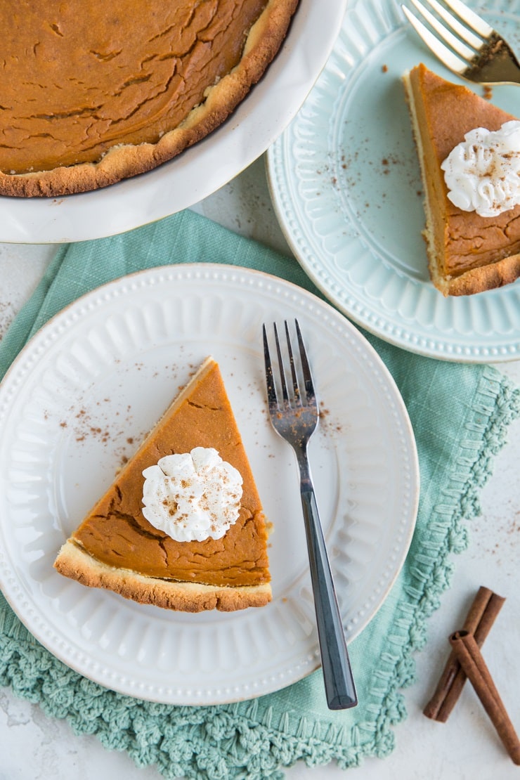 Paleo Sweet Potato Pie - a healthy sweet potato pie recipe that is grain-free, dairy-free, and refined sugar-free. Silky smooth and delicious!