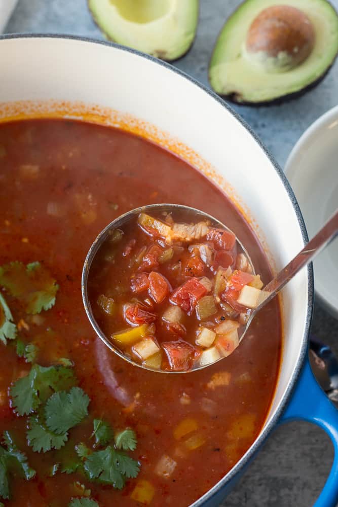 This Paleo Turkey Tortilla Soup is a healthy version of the classic. Made with veggies, spices, and leftover turkey, it’s a warm and comforting recipe that’s super easy to make. Plus it’s gluten free and Whole30 compatible!