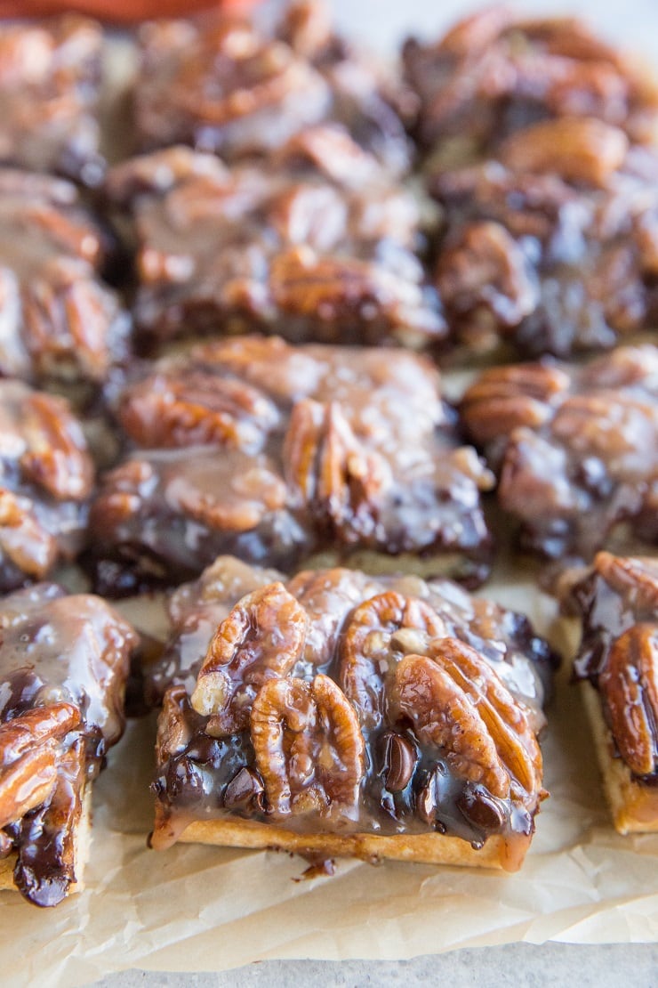 Paleo Vegan Chocolate Pecan Pie Bars made grain-free, dairy-free, egg-free. These gooey, delicious crumb bars are completely delicious!