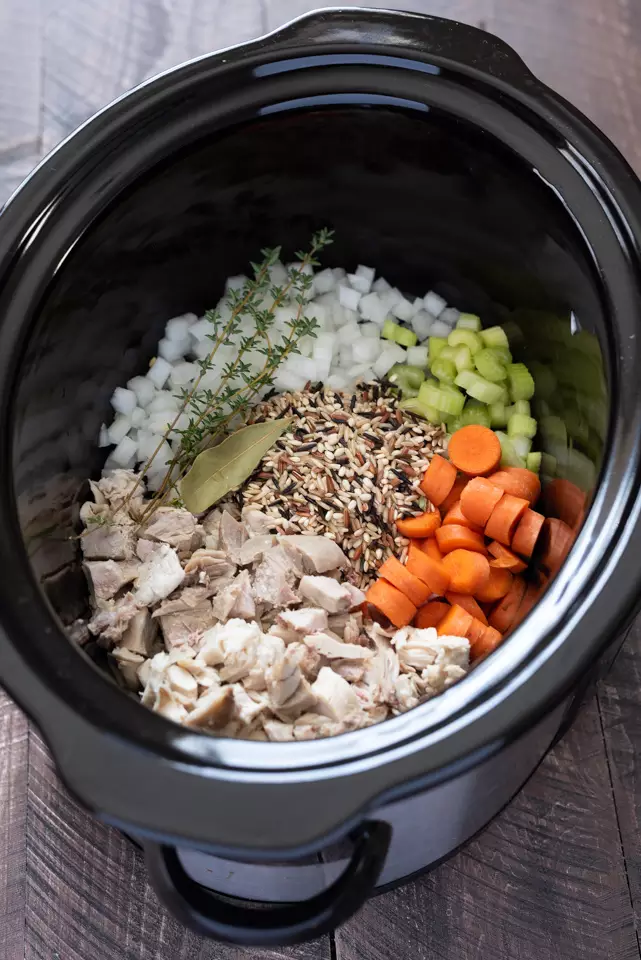 Put that leftover turkey to the best use possible in this Slow Cooker Turkey Wild Rice Soup!  It’s hearty, naturally gluten free, and is the easiest dump ‘n go recipe!