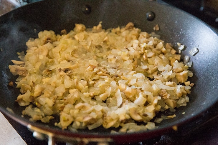 Add the mushroom stems and garlic