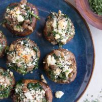 Ground Beef & Feta Stuffed Mushrooms with caramelized onion, garlic, and spinach makes for the perfect bite! This simple yet powerfully flavorful appetizer recipe is a winner for any gathering!