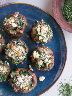 Ground Beef & Feta Stuffed Mushrooms with caramelized onion, garlic, and spinach makes for the perfect bite! This simple yet powerfully flavorful appetizer recipe is a winner for any gathering!