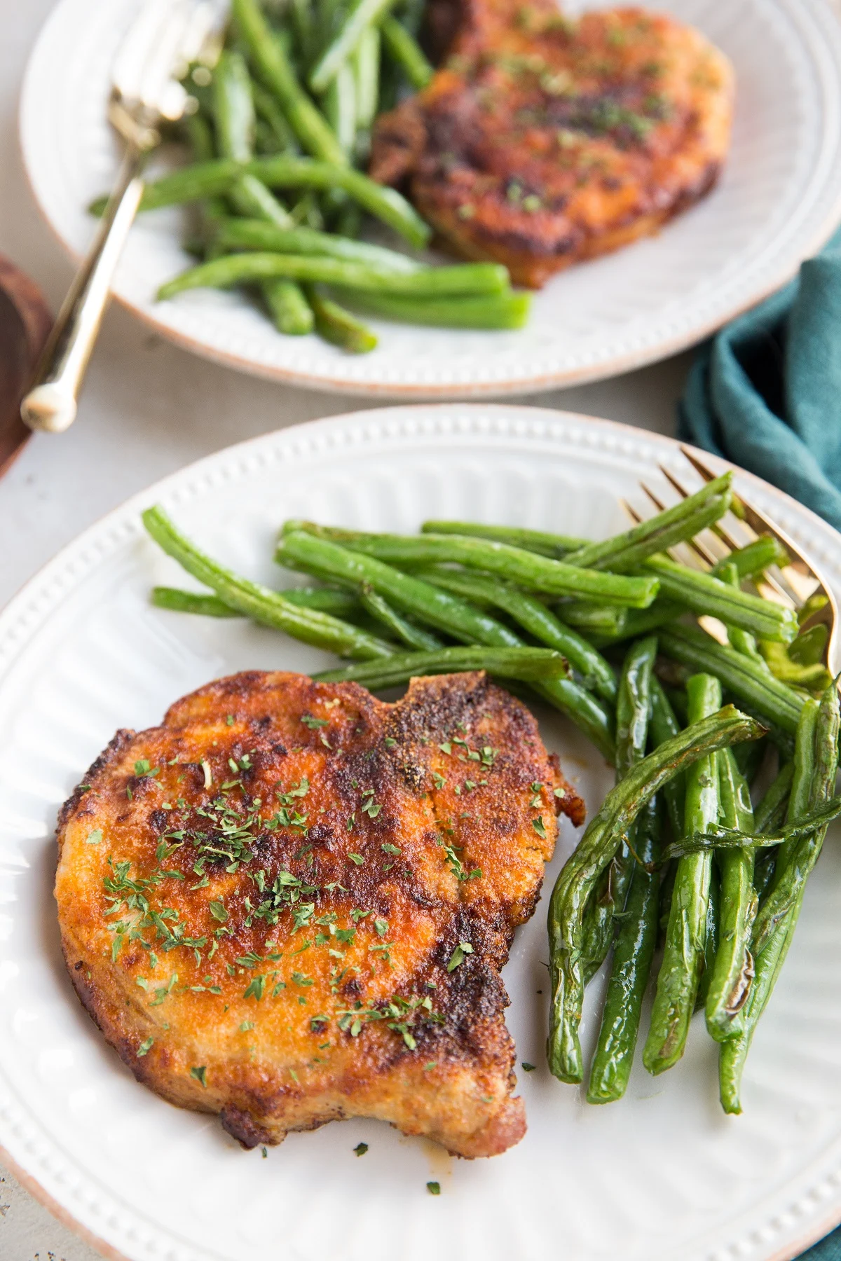 Easy Air Fryer Pork Chops and green beans - a simple, healthful low-carb dinner recipe, ready in a flash!