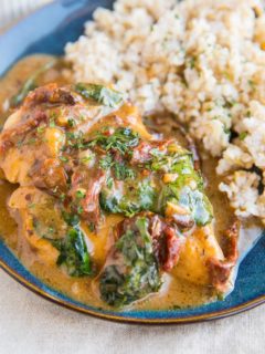 Instant Pot Creamy Tuscan Chicken with sun-dried tomatoes and spinach. A healthy flavorful easy dinner recipe.