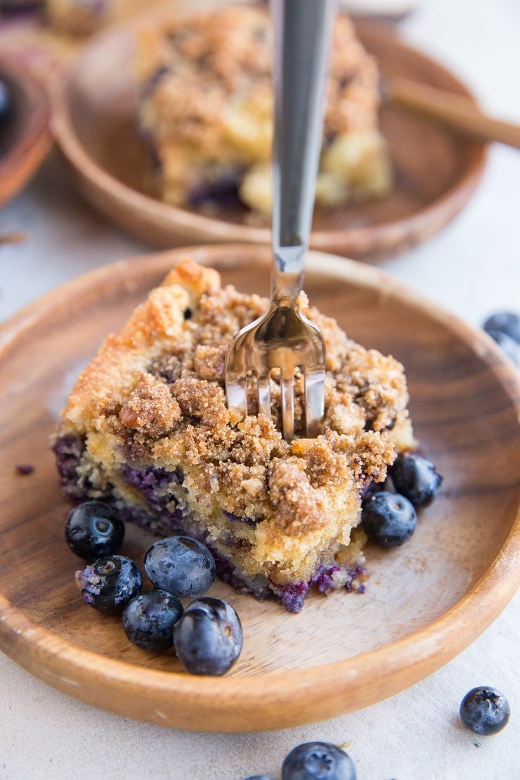Slice of keto blueberry coffee cake on two plates