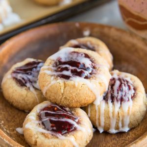 Keto Raspberry Thumbprint Cookies (Vegan, dairy-free, grain-free, egg-free) - these easy thumbprint cookies are a lovely gluten-free Christmas dessert!